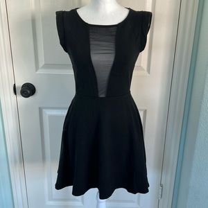 Bebe black cocktail dress deep V and mesh
